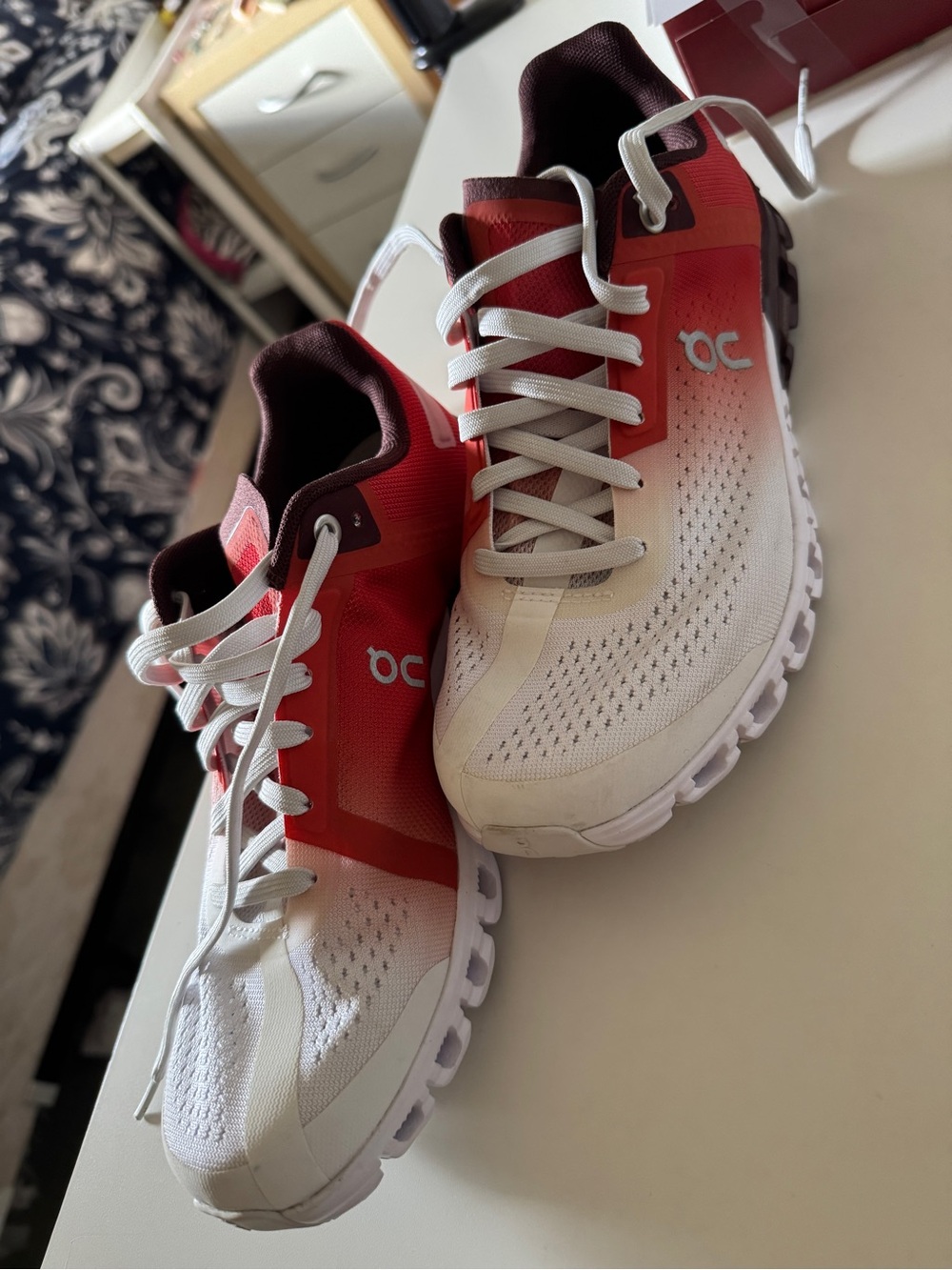 On Running Women’s Cloudsurfer Red to White Gradient Athletic Shoes